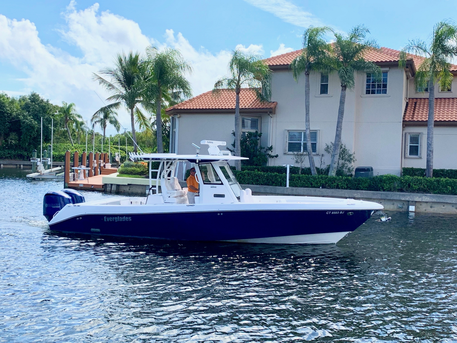 Blue hulled 2019 Everglades 335 on the water